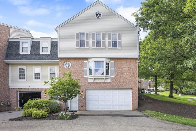 401 Olde Ingomar Ct, Mccandless, PA 15237 - view of front of home featuring brick siding, driveway, an attached garage, and roof with shingles