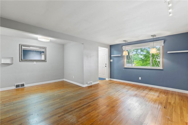 601 4th St, Penn Hills, PA 15147 - empty room featuring hardwood / wood-style flooring