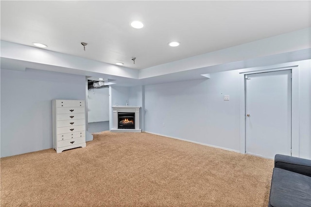 601 4th St, Penn Hills, PA 15147 - unfurnished living room with carpet floors, a warm lit fireplace, and recessed lighting