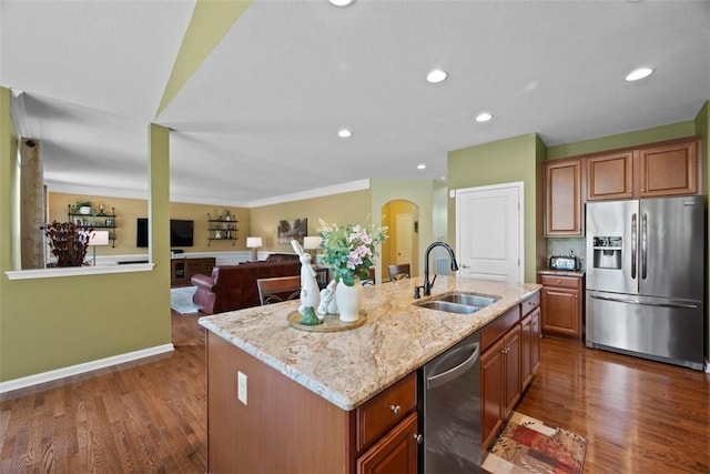 743 Packsaddle Trl, Richland, PA 15044 - kitchen with appliances with stainless steel finishes, arched walkways, light stone countertops, dark wood-style flooring, and recessed lighting