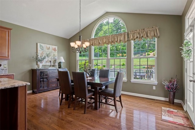 743 Packsaddle Trl, Richland, PA 15044 - dining space featuring light wood-style floors, vaulted ceiling, and a chandelier