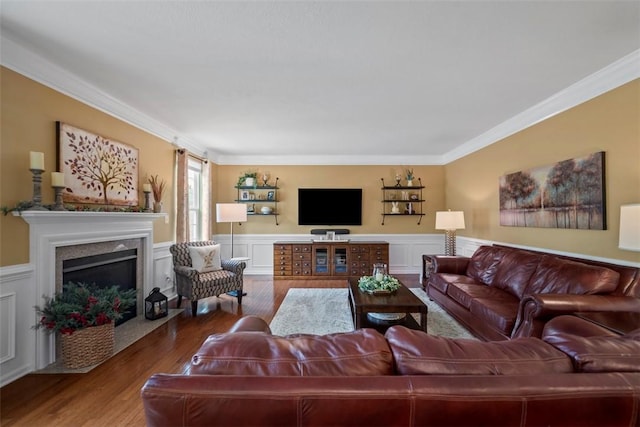 743 Packsaddle Trl, Richland, PA 15044 - living room featuring wood finished floors, crown molding, a wainscoted wall, and a premium fireplace