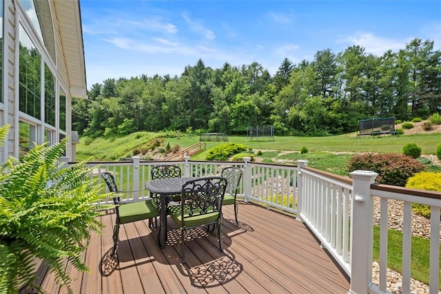 743 Packsaddle Trl, Richland, PA 15044 - wooden terrace featuring a trampoline, a lawn, and outdoor dining space