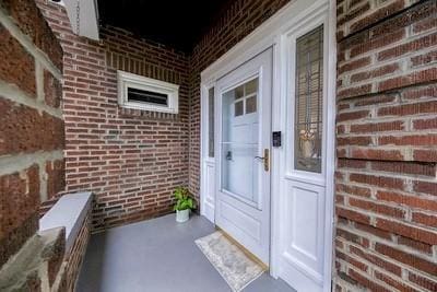 2267 Tilbury Ave, Squirrel Hill, PA 15217 - view of exterior entry featuring brick siding and a porch