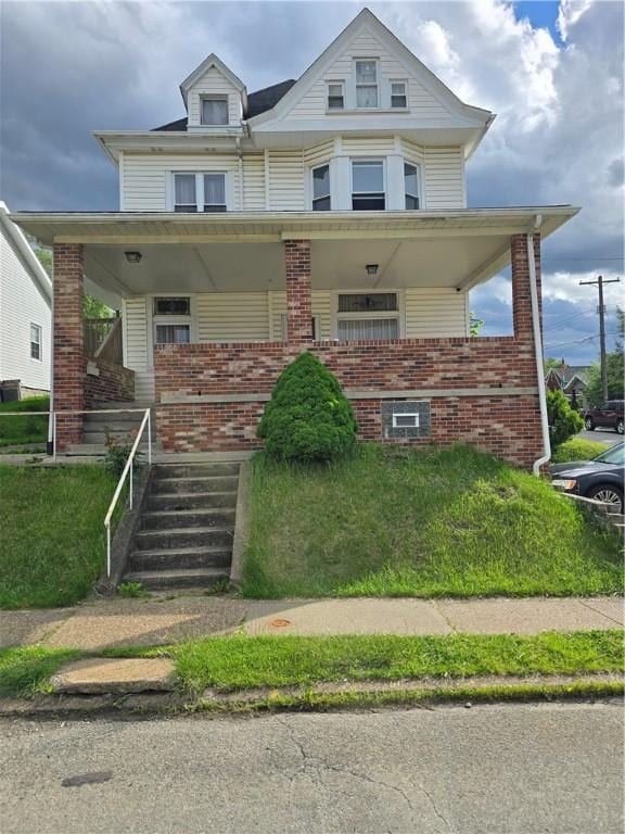 1000 Washington, Port Vue, PA 15133 - view of front of property featuring brick siding and covered porch