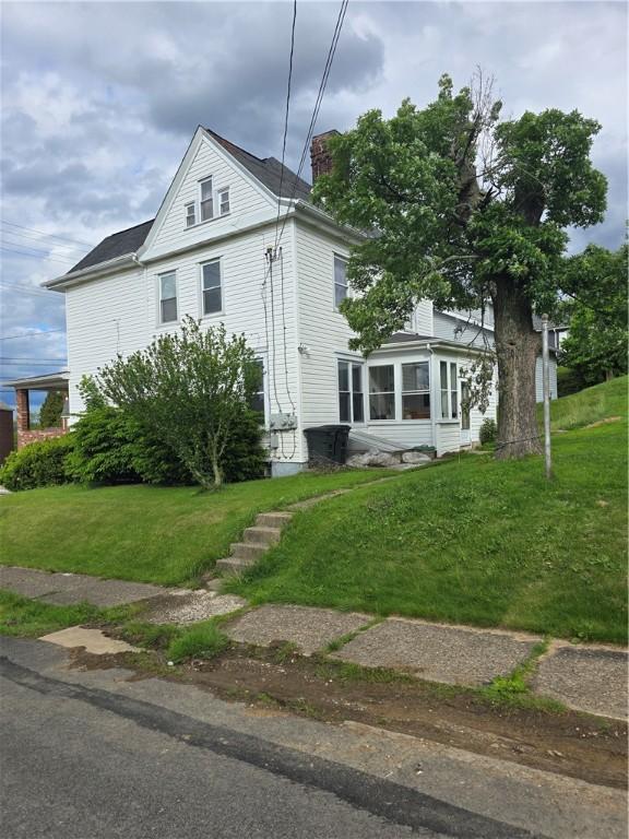 1000 Washington, Port Vue, PA 15133 - view of front of home with a front lawn