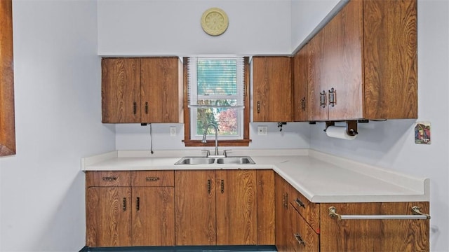 304 Wylie Ave, Elizabeth Twp/Boro, PA 15037 - kitchen featuring brown cabinetry and light countertops