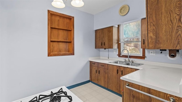 304 Wylie Ave, Elizabeth Twp/Boro, PA 15037 - kitchen featuring light countertops, light flooring, and brown cabinetry
