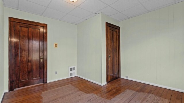 304 Wylie Ave, Elizabeth Twp/Boro, PA 15037 - unfurnished room featuring hardwood / wood-style flooring and a drop ceiling