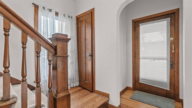 304 Wylie Ave, Elizabeth Twp/Boro, PA 15037 - entryway with arched walkways, wood finished floors, and stairs