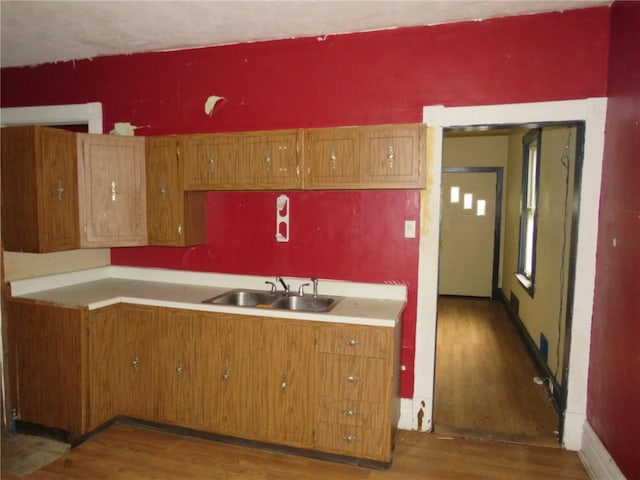 1465 Steuben St, Crafton Heights, PA 15205 - kitchen with wood finished floors, brown cabinets, and light countertops