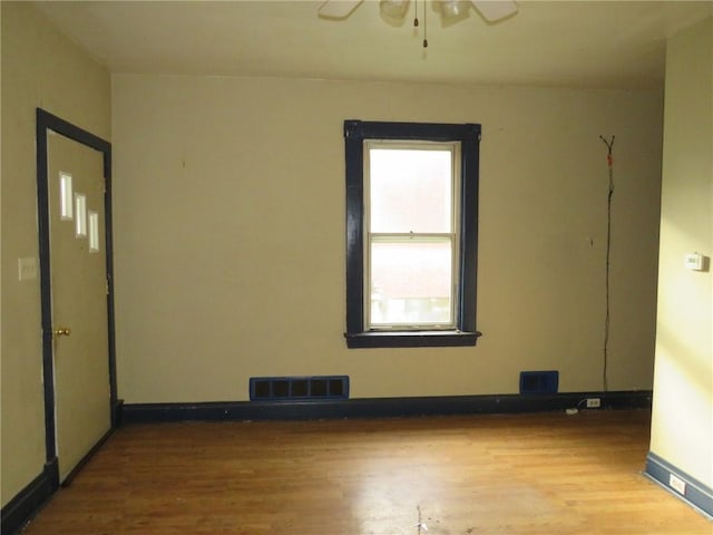 1465 Steuben St, Crafton Heights, PA 15205 - unfurnished room with wood finished floors and ceiling fan