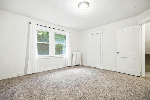 1334 Franklin Ave, Wilkinsburg, PA 15221 - unfurnished bedroom featuring radiator heating unit and carpet