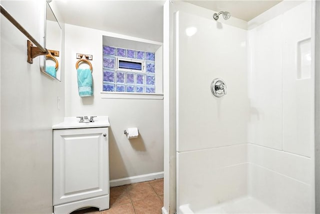1334 Franklin Ave, Wilkinsburg, PA 15221 - full bath with a stall shower, vanity, and tile patterned floors