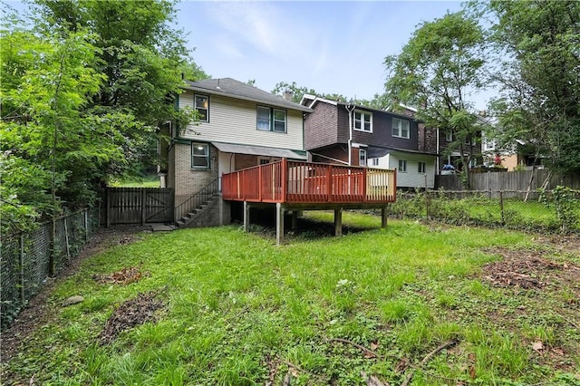 1334 Franklin Ave, Wilkinsburg, PA 15221 - back of property with a wooden deck and a fenced backyard