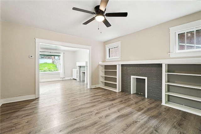 1334 Franklin Ave, Wilkinsburg, PA 15221 - unfurnished living room with wood finished floors and a ceiling fan