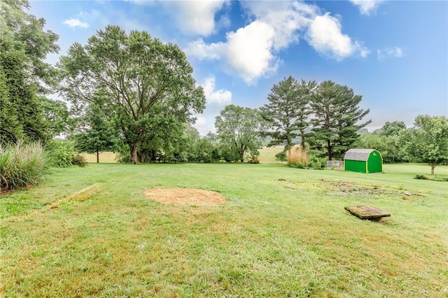 1451 W Pittsburgh St, East Huntingdon, PA 15683 - view of green lawn featuring a storage shed