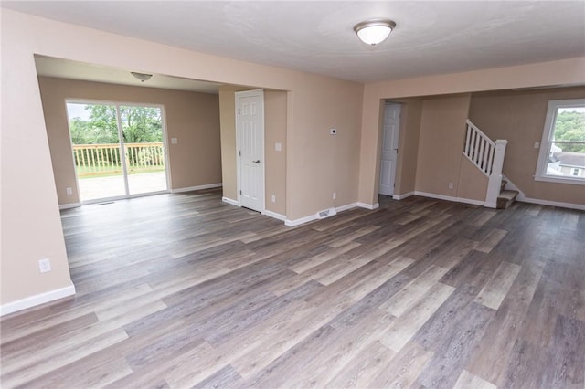 1451 W Pittsburgh St, East Huntingdon, PA 15683 - unfurnished room featuring wood finished floors and stairs