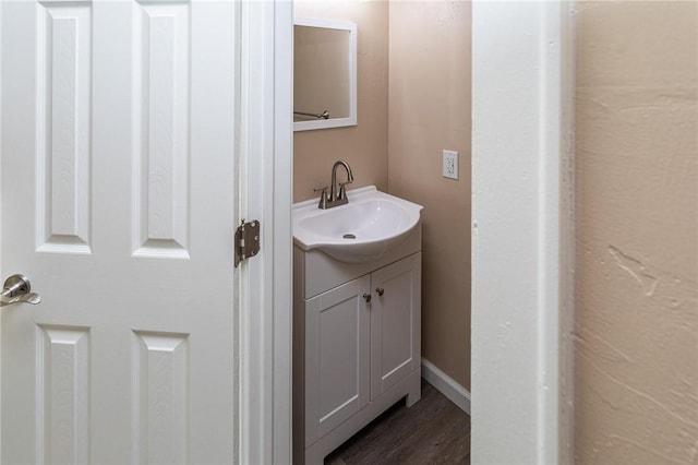 1451 W Pittsburgh St, East Huntingdon, PA 15683 - bathroom featuring vanity and wood finished floors