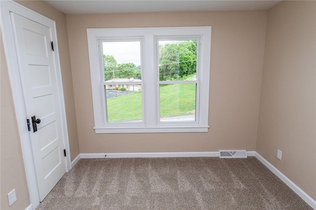 1451 W Pittsburgh St, East Huntingdon, PA 15683 - empty room featuring healthy amount of natural light and carpet
