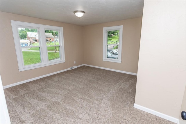 1451 W Pittsburgh St, East Huntingdon, PA 15683 - carpeted empty room featuring baseboards