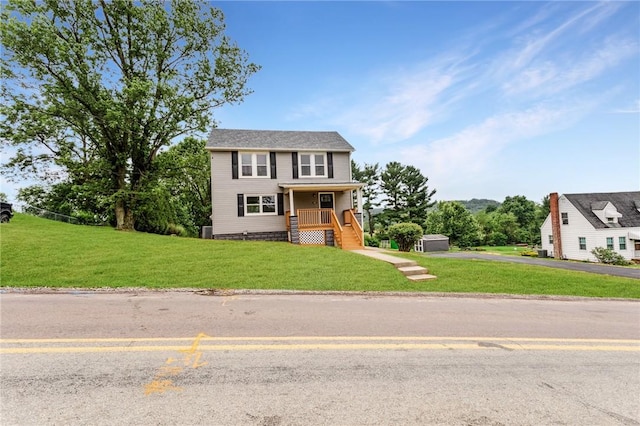 1451 W Pittsburgh St, East Huntingdon, PA 15683 - view of front facade featuring a front lawn and driveway
