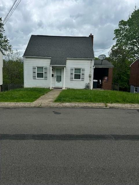 1055 Laurel St, Bridgeville, PA 15017 - cape cod home with a chimney and a shingled roof