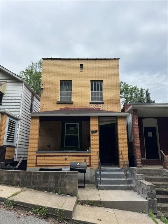 125 Frazier Ave, Stowe Twp, PA 15136 - view of front of property featuring brick siding, entry steps, and covered porch