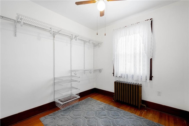512 Gorgas St, Arlington, PA 15210 - walk in closet with radiator, ceiling fan, and wood finished floors