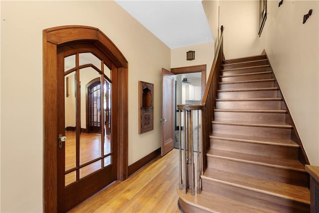 512 Gorgas St, Arlington, PA 15210 - stairway with wood finished floors and arched walkways