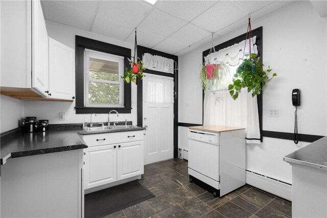 512 Gorgas St, Arlington, PA 15210 - kitchen featuring a paneled ceiling, white cabinetry, white dishwasher, dark countertops, and a baseboard radiator