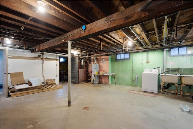 512 Gorgas St, Arlington, PA 15210 - below grade area with washer / dryer, gas water heater, and plenty of natural light