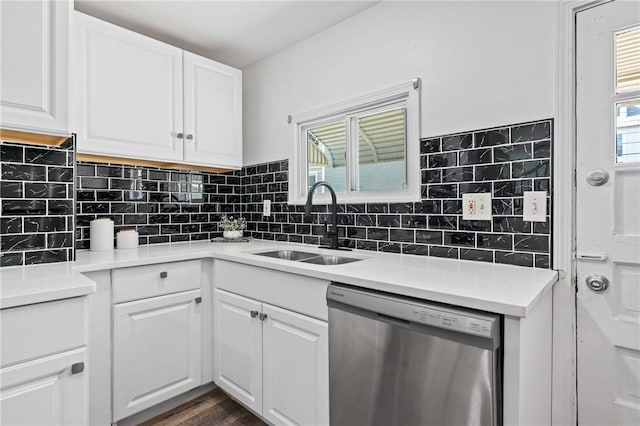 3817 Howley St, Lawrenceville, PA 15201 - kitchen with dishwasher, white cabinets, tasteful backsplash, light countertops, and dark wood-type flooring