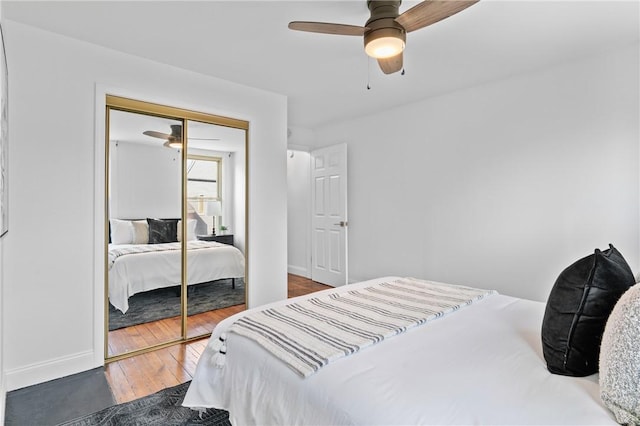3817 Howley St, Lawrenceville, PA 15201 - bedroom featuring hardwood / wood-style floors, a closet, and a ceiling fan