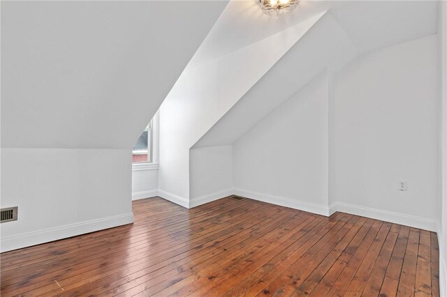 3817 Howley St, Lawrenceville, PA 15201 - bonus room with vaulted ceiling and hardwood / wood-style floors