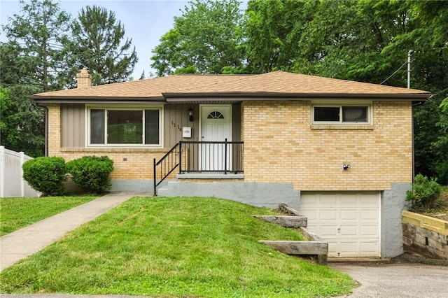 1114 Ellopia St, Chartiers City, PA 15204 - view of front of house with a garage, a chimney, brick siding, and asphalt driveway