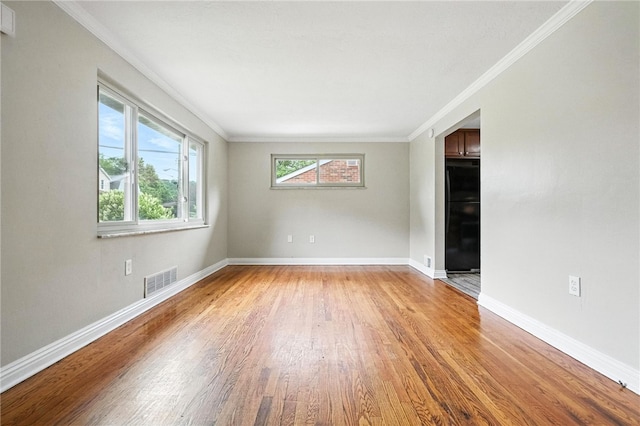 1114 Ellopia St, Chartiers City, PA 15204 - spare room with light wood-style flooring and ornamental molding