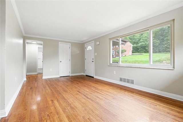 1114 Ellopia St, Chartiers City, PA 15204 - unfurnished living room featuring light wood-style floors and crown molding