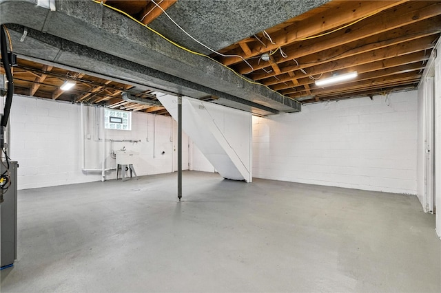 1114 Ellopia St, Chartiers City, PA 15204 - basement featuring a sink and concrete block wall