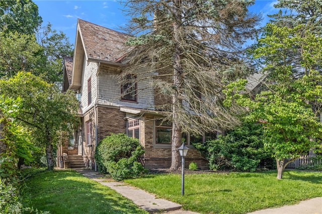 6517 Aylesboro Ave, Squirrel Hill, PA 15217 - view of front facade with brick siding and a front lawn