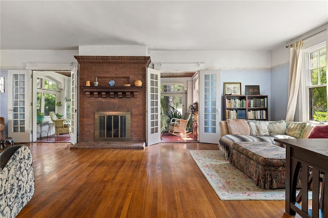 6517 Aylesboro Ave, Squirrel Hill, PA 15217 - living room with wood finished floors and a fireplace