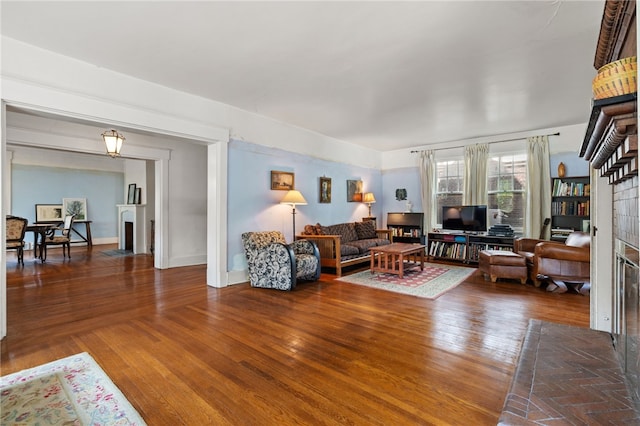 6517 Aylesboro Ave, Squirrel Hill, PA 15217 - living room featuring a fireplace and wood finished floors