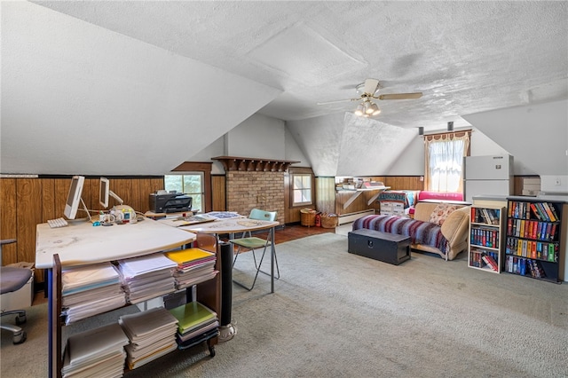 6517 Aylesboro Ave, Squirrel Hill, PA 15217 - carpeted bedroom with a textured ceiling, freestanding refrigerator, wood walls, multiple windows, and baseboard heating