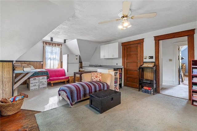 6517 Aylesboro Ave, Squirrel Hill, PA 15217 - bedroom featuring freestanding refrigerator, a textured ceiling, vaulted ceiling, and ceiling fan