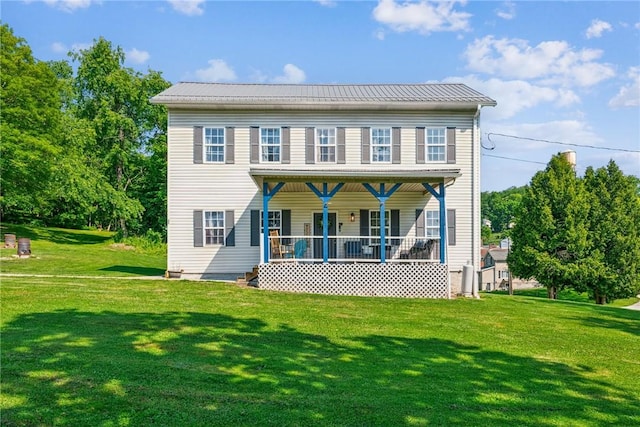 27 Richeyville Rd, Centerville, PA 15358 - rear view of property with covered porch, a yard, and a metal roof