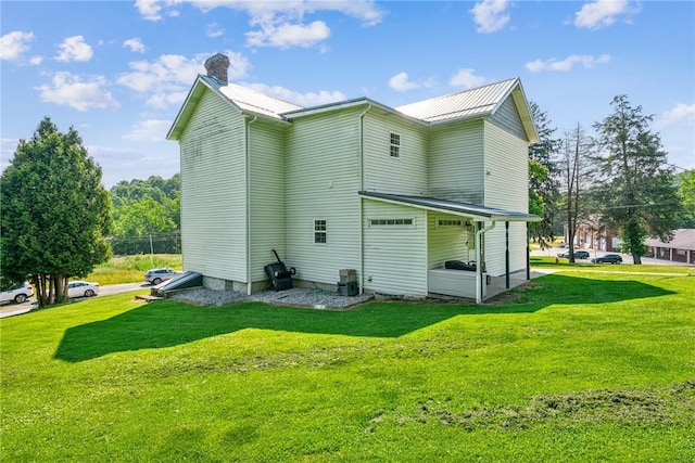 27 Richeyville Rd, Centerville, PA 15358 - rear view of property featuring a lawn, a chimney, and a metal roof