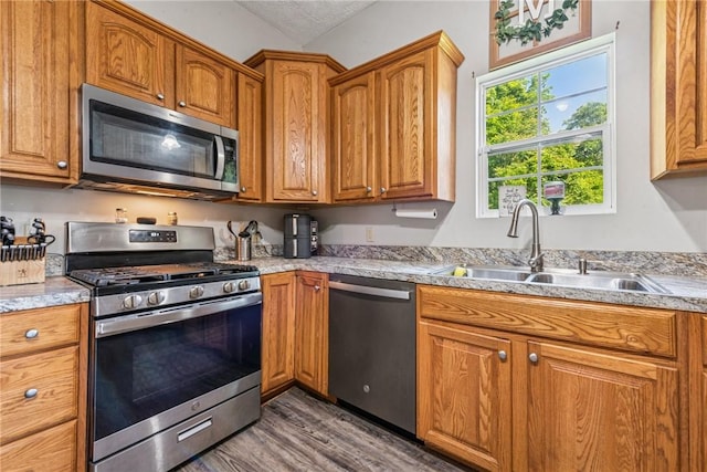 27 Richeyville Rd, Centerville, PA 15358 - kitchen featuring appliances with stainless steel finishes, wood finished floors, and light countertops