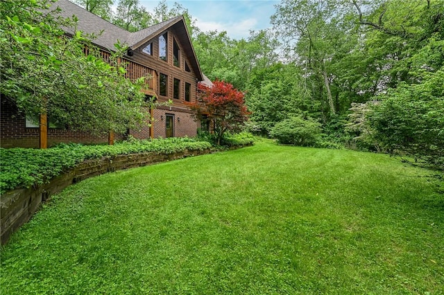 117 Oak Dr, Forward Twp But, PA 16033 - view of green lawn with a deck