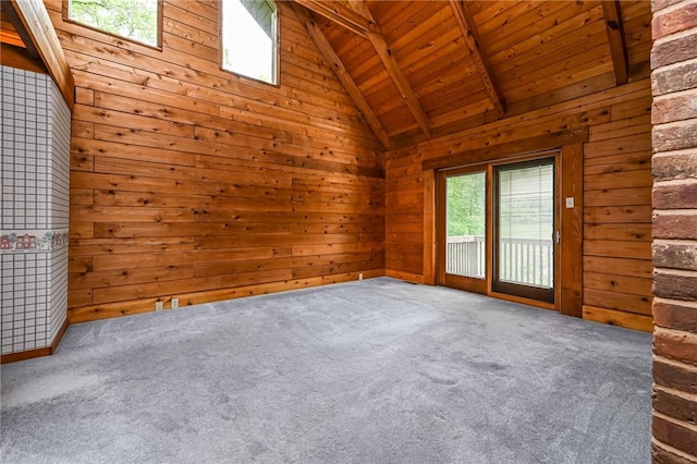 117 Oak Dr, Forward Twp But, PA 16033 - carpeted empty room with wood walls and wooden ceiling