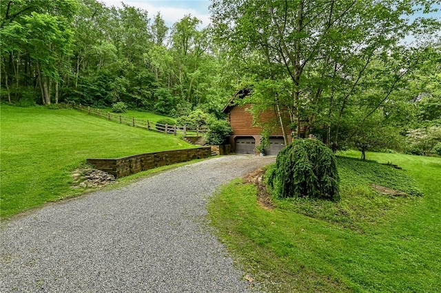 117 Oak Dr, Forward Twp But, PA 16033 - view of front of home with gravel driveway and a garage